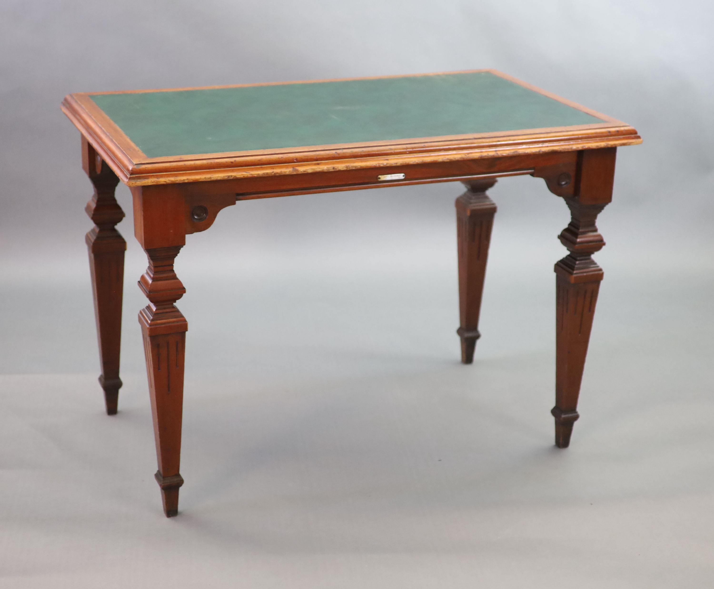 A Victorian mahogany writing table, supplied by Sage & Co. Shopfitters of London, W.112cm D.68cm H.79cm